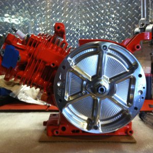 Re-assembled block with flywheel
