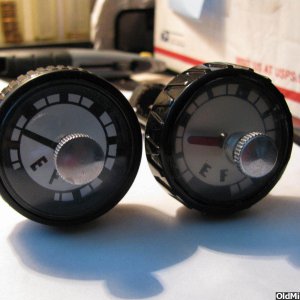 repro bonanza style vented gas gauge cap (left, OG on the right)