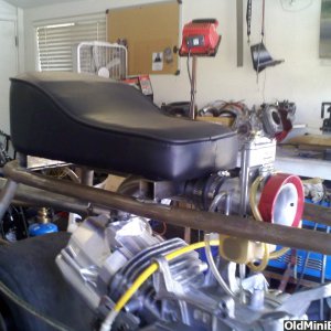 Seat has been notched to sit flush  on frame