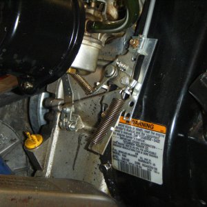 New style Tecumseh throttle linkage.