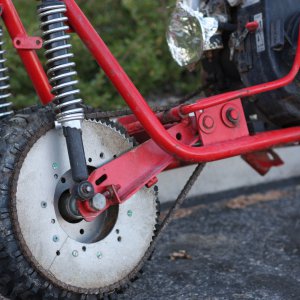 red minibike rear right wheel shot