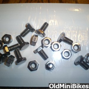 Original wheel hardware after spending time in a vibratory parts tumbler