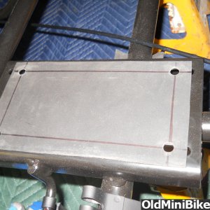 Rubber engine mounting plate gasket.