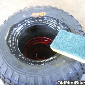 Installing valve stem and mounting tire.